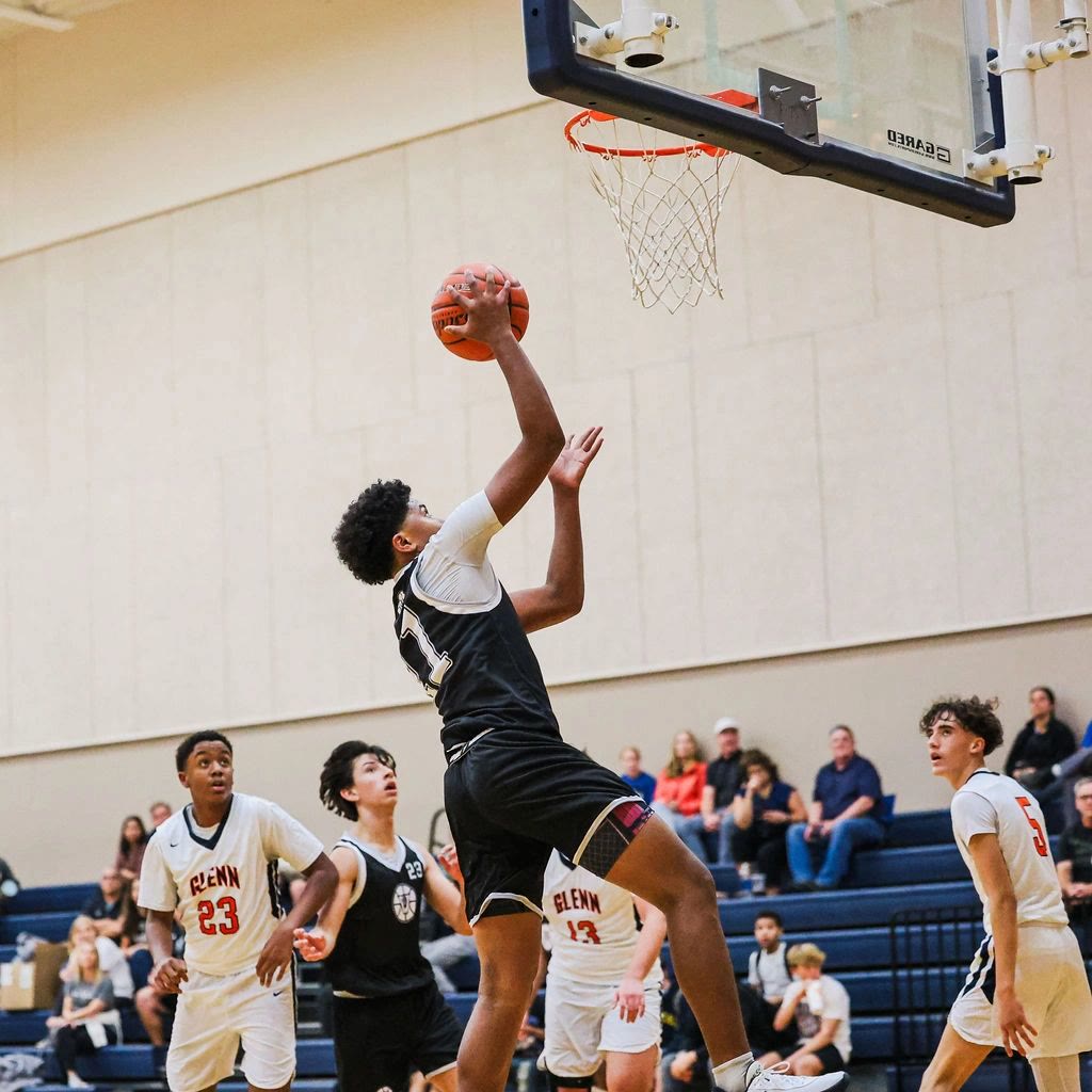 A Vandegrift basketball player in game action